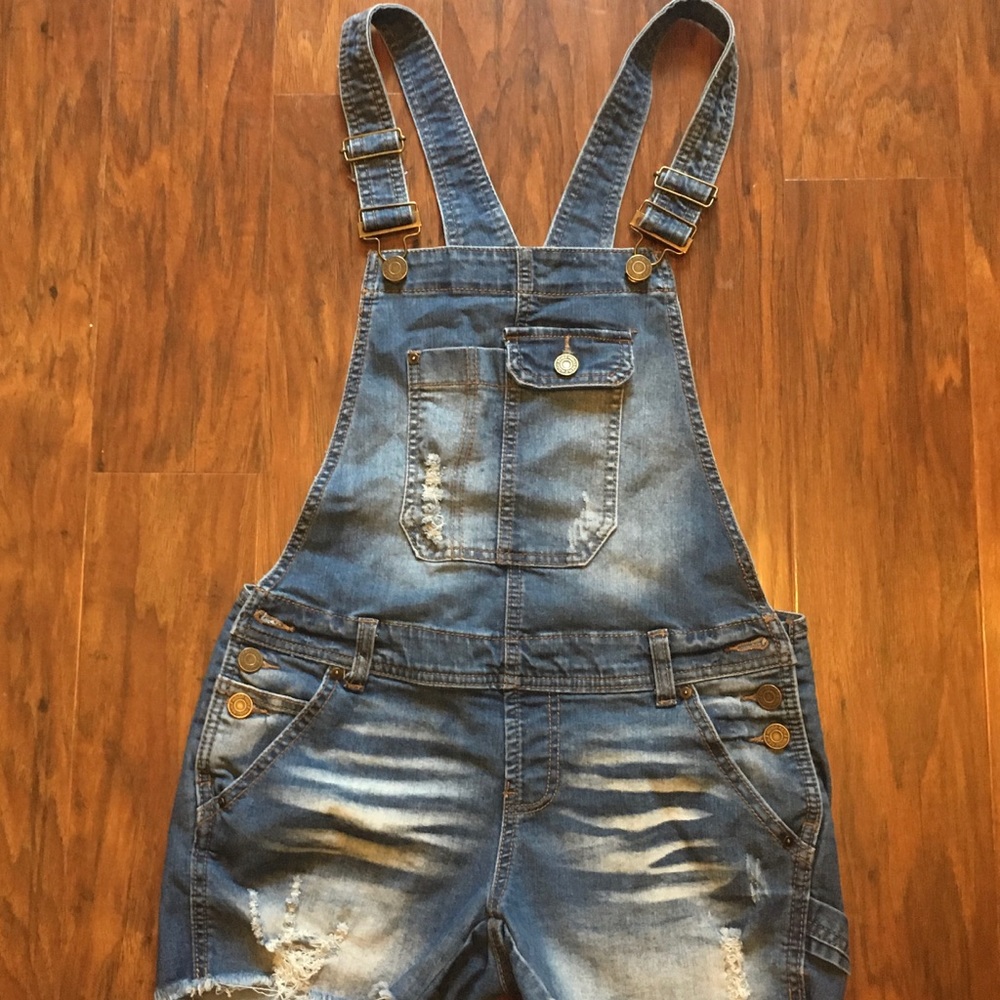 Distressed overall jean shorts